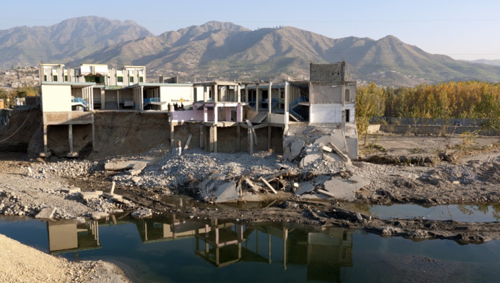 Buildings partly destroyed by the 2010 floods in Pakistan