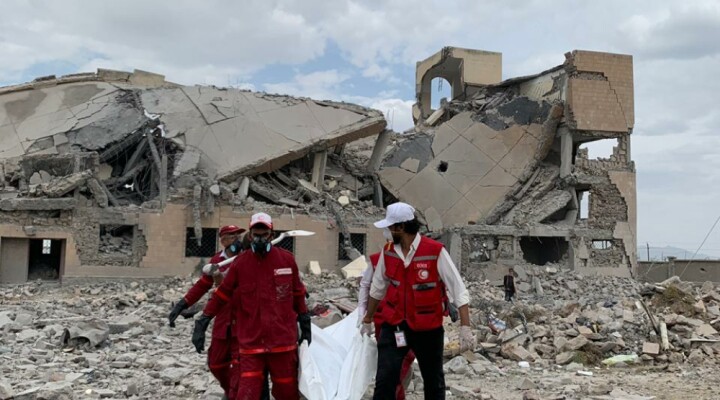 Yemeni Red Crescent teams work on retrieving bodies at the scene of an airstrike in Dhamar, Yemen on Sunday. It’s thought that all of the detainees in the building were either killed or injured, according to an ICRC team on the ground.