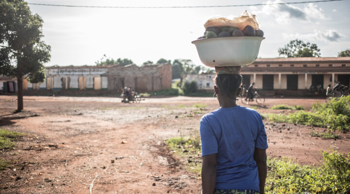 An avocado seller leaves for the market in a Muslim neighbourhood of Bangassou, south-eastern CAR, that was severely affected by the conflict.    Florent Vergnes/ICRC